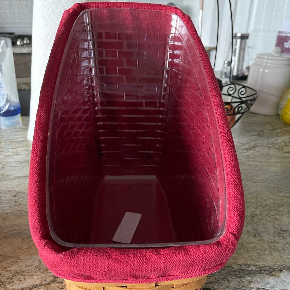Two Longaberger baskets with liners.